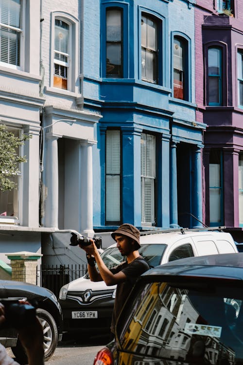 Man Taking a Photo in Notting Hill