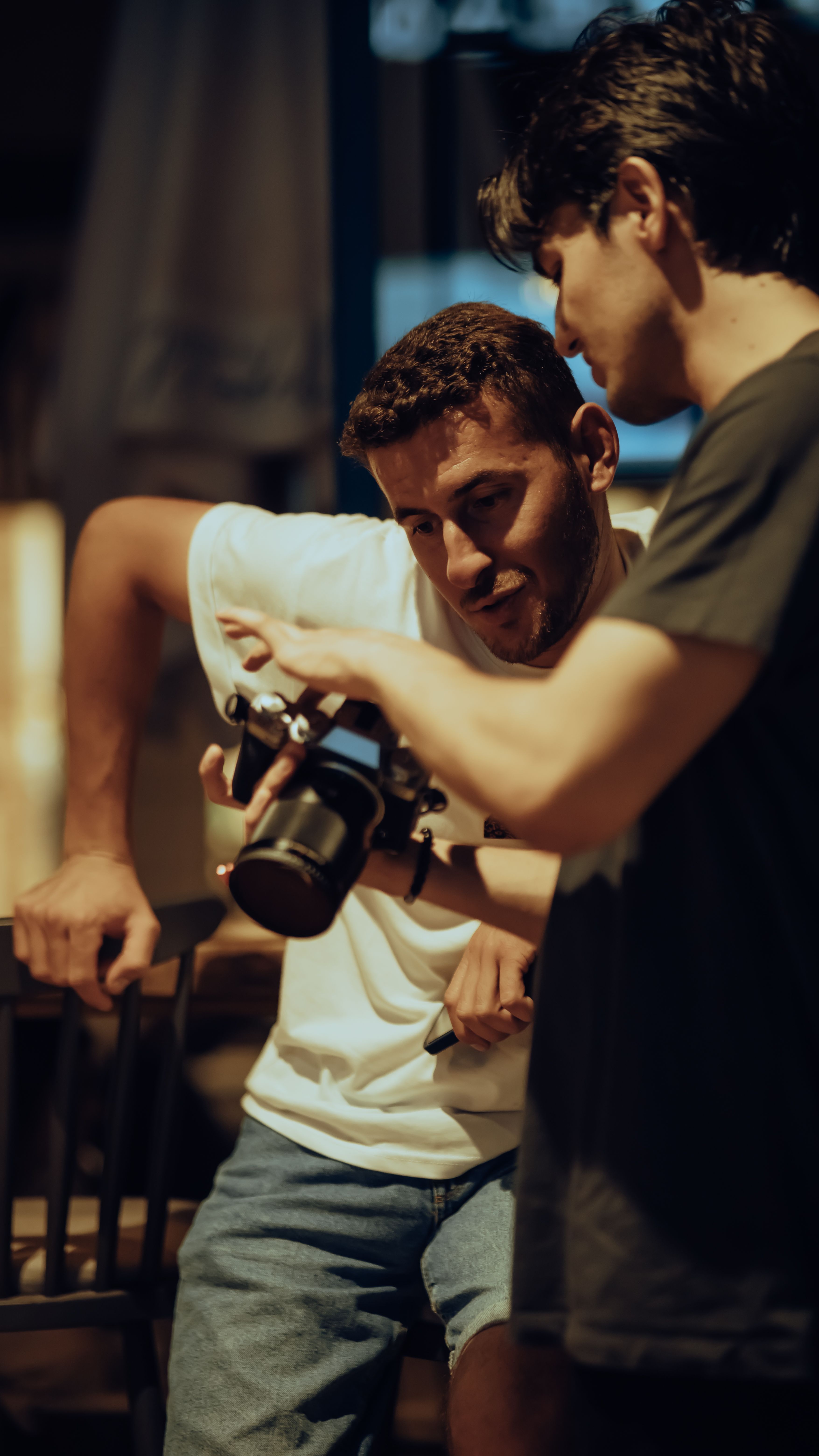 Men Looking on Camera Screen · Free Stock Photo