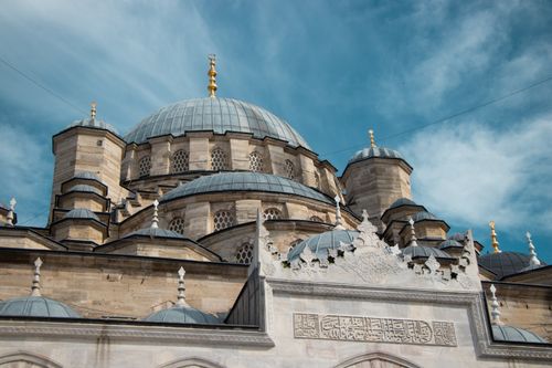 Free Stunning low-angle view of a mosque dome exemplifying Ottoman architecture against a clear sky. Stock Photo