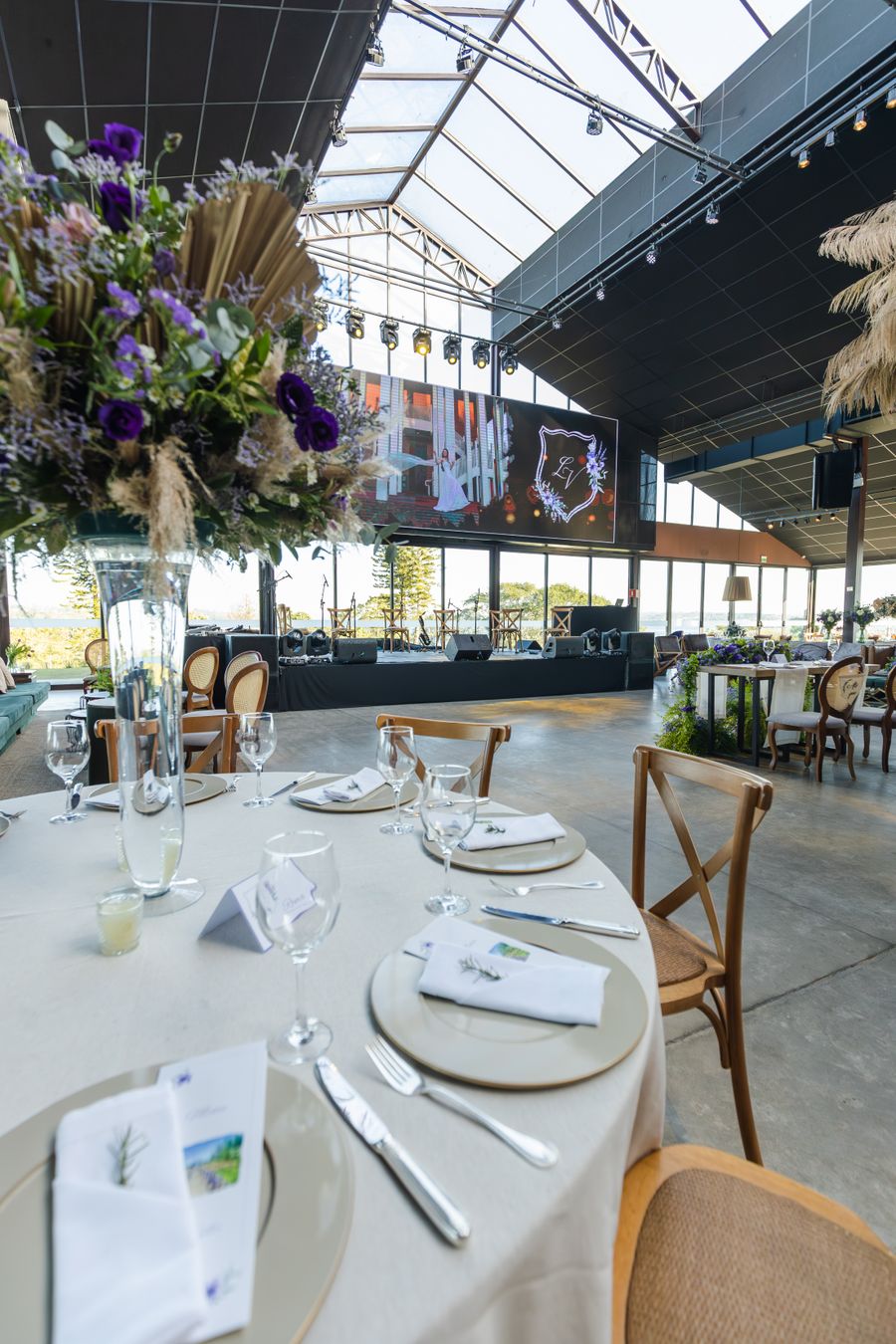 Sophisticated banquet table setting with floral arrangements