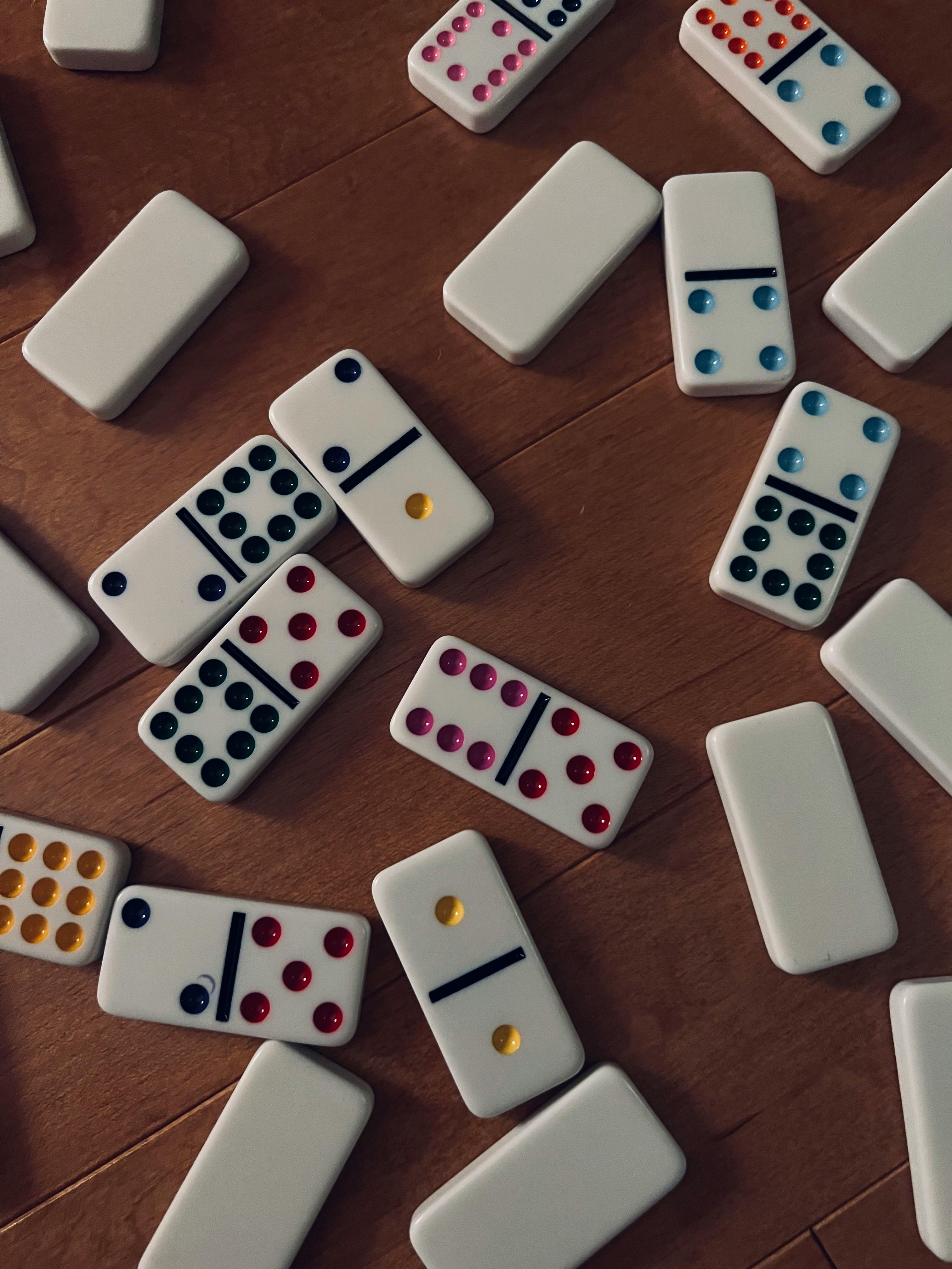 Hand Stopping Domino Effect · Free Stock Photo