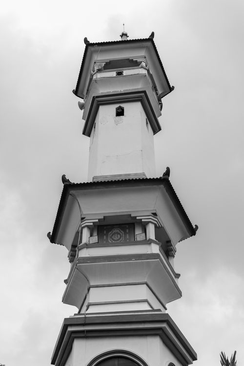 Free Black and white photo of a tall Islamic architectural tower in Ponorogo, East Java, Indonesia. Stock Photo