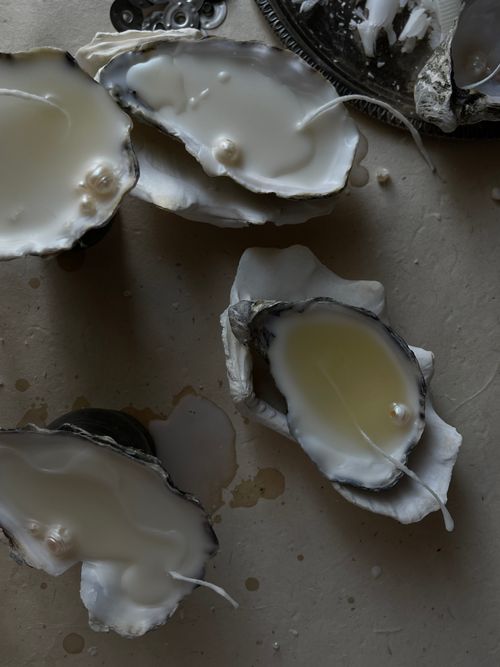 Free Artistic shot of opened oysters revealing pearls, emphasizing texture and contrast. Stock Photo