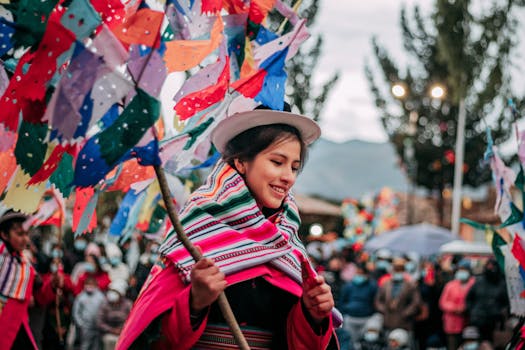 Traditional Peruvian parade in Jauja with vibrant textiles and flags.