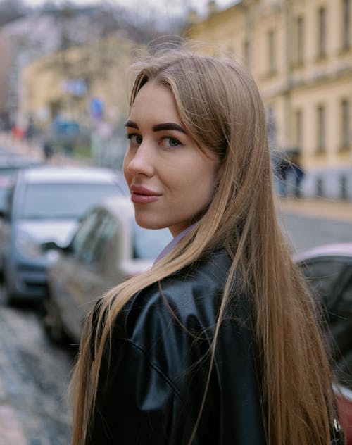 Brunette Woman Wearing Coat on a Street