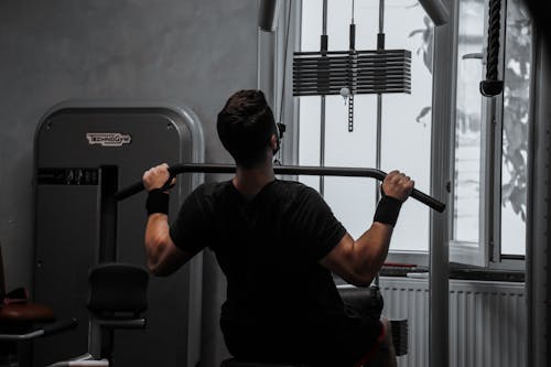 Man Exercising at the Gym 