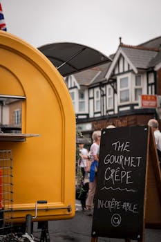 Street view of a gourmet crêpe stall at Highcliffe market, showcasing vibrant urban atmosphere.