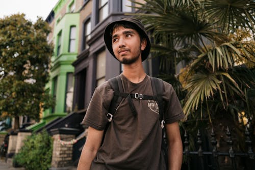 Young Backpacker in a City 