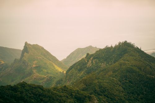 Free Captivating aerial view of lush green mountains in CN, Spain, showcasing nature's beauty. Stock Photo