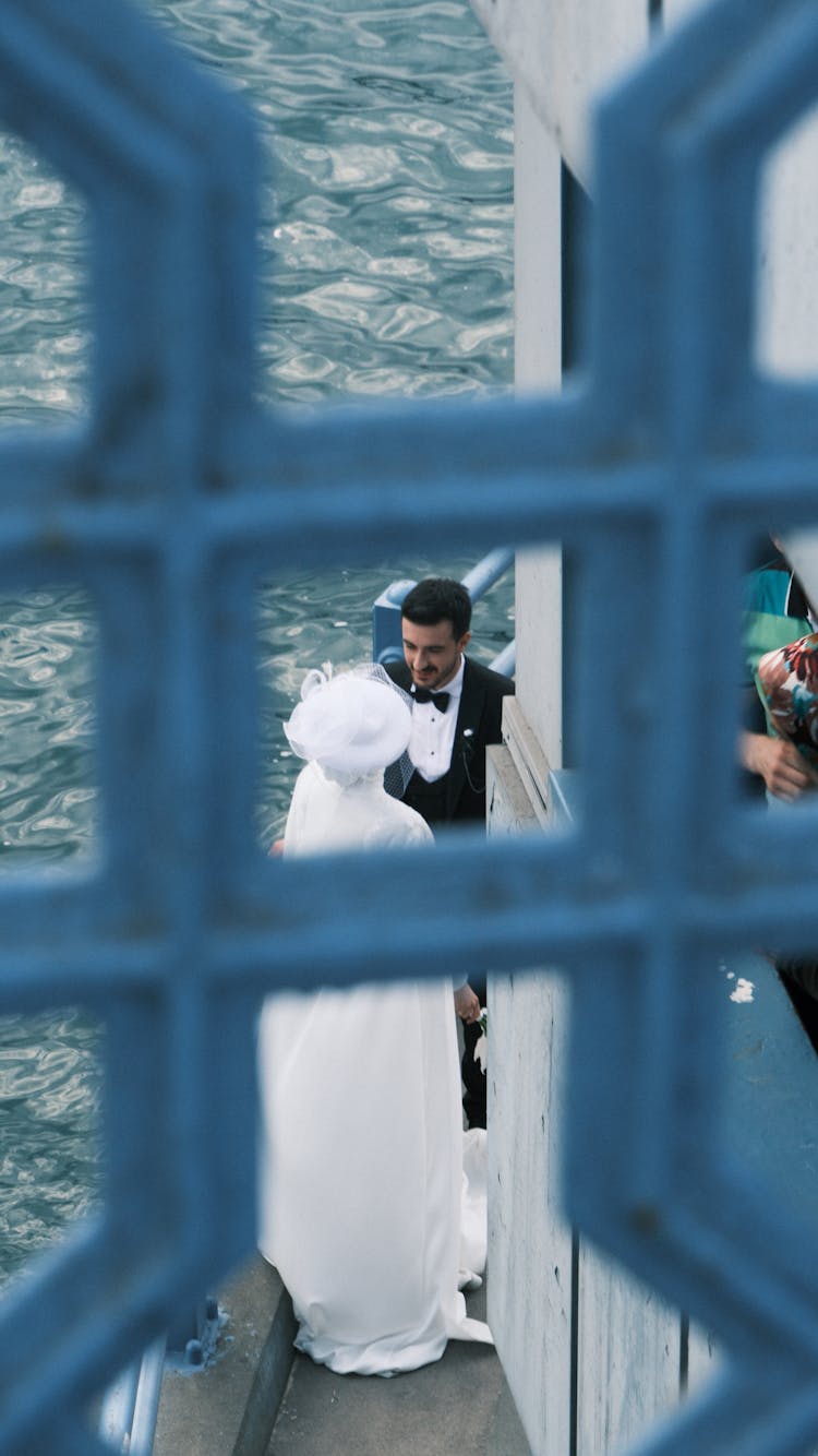 Wedding Couple Seen From A Window