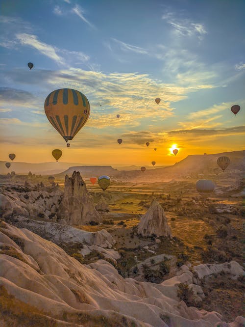 Balloons Flying over Cappadocia at Sunset
