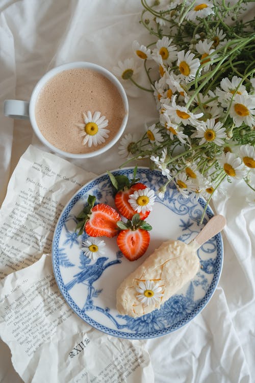 Free Strawberries and Ice Cream Served with Coffee on Ceramic Plate Stock Photo