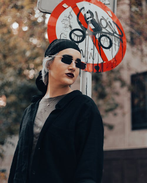 Woman in Sunglasses and Black Clothes