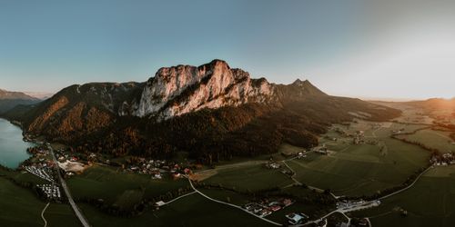 Free Stunning aerial photo of Mondsee and mountains during sunset, showcasing tranquil nature and landscapes in Upper Austria. Stock Photo