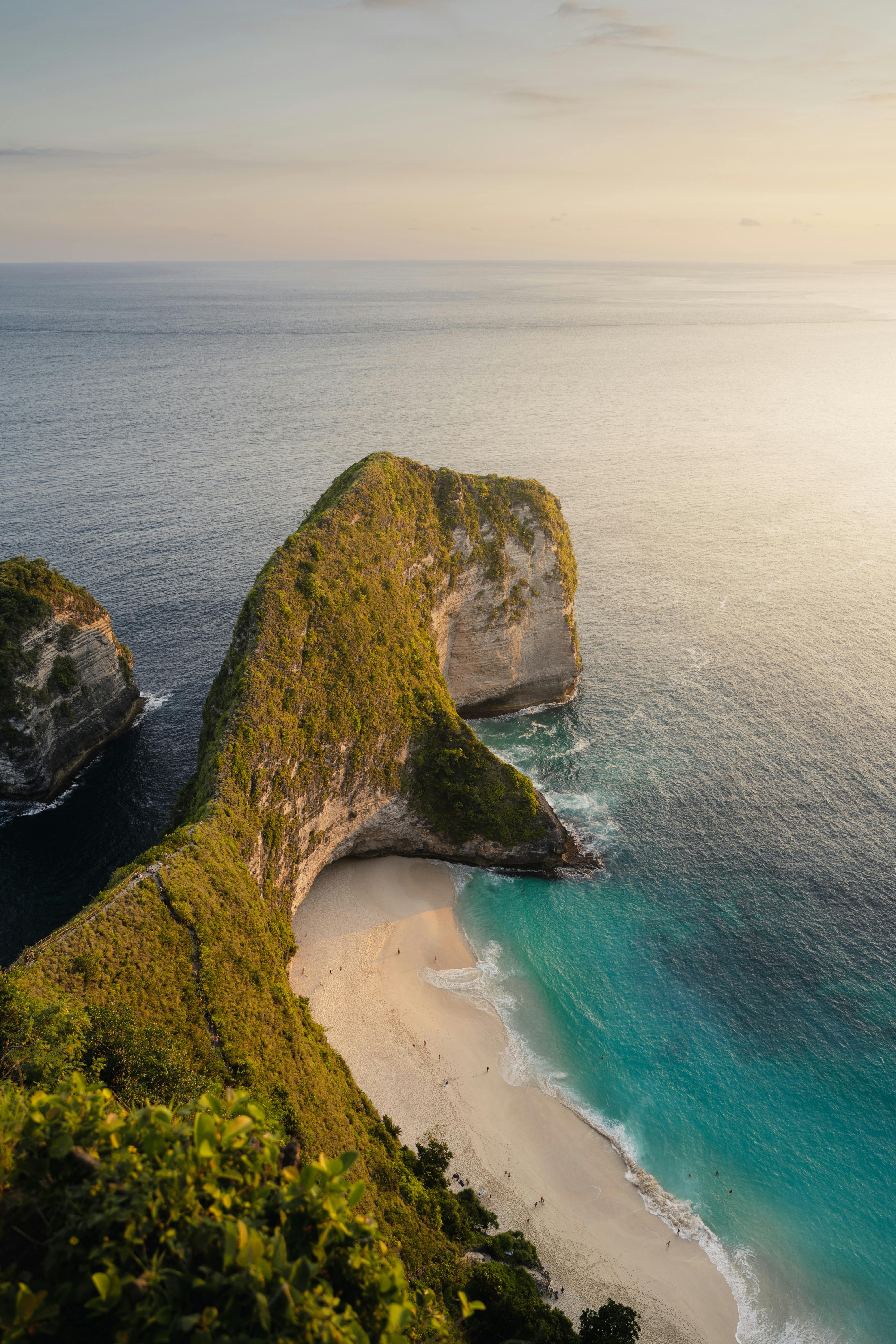 Kelingking Beach T-Rex cliff formation and turquoise coastline on Nusa Penida island near Bali