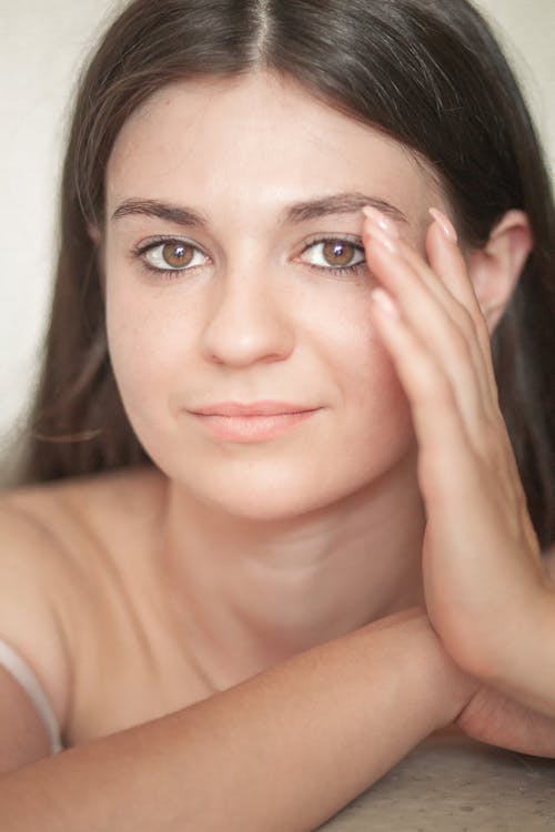 Portrait of Woman with Hand on Cheek