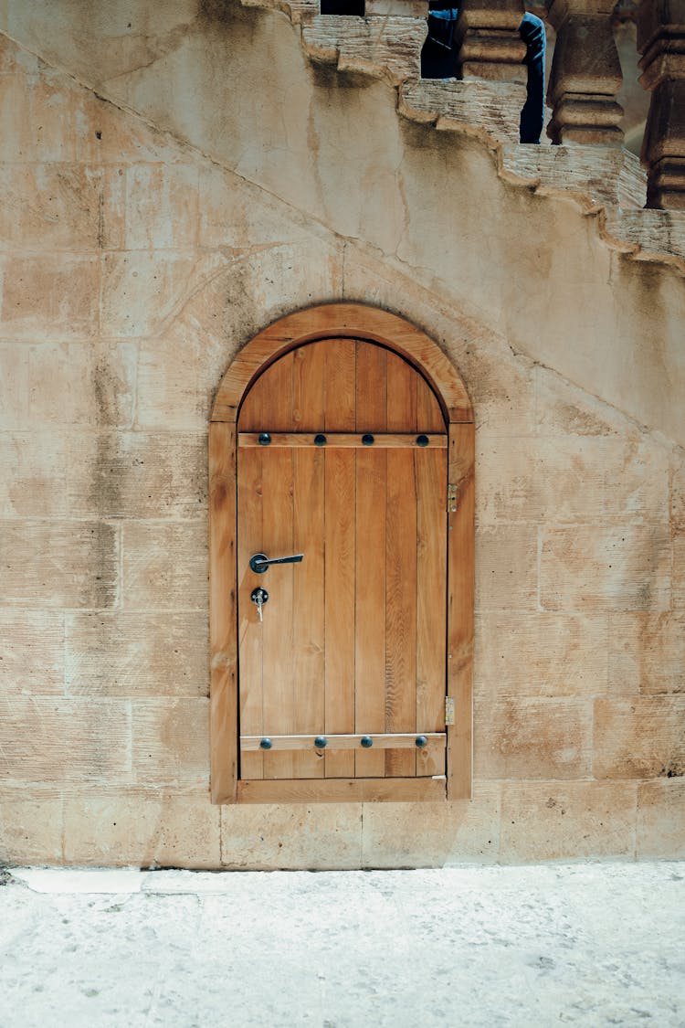 Wooden Door Under Steps