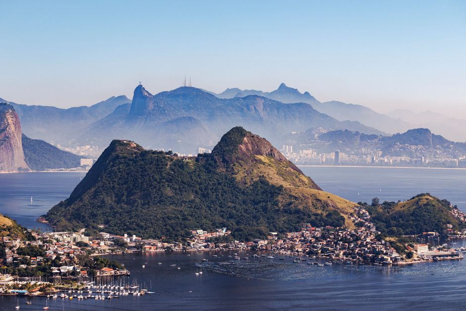 Amazing Helicopter Ride in Rio de Janeiro - 30 Minutes by Comandante Nobre Review Review 2026 - Stunning aerial view of Niterói, Brazil with Sugarloaf Mountain and scenic coastlines.