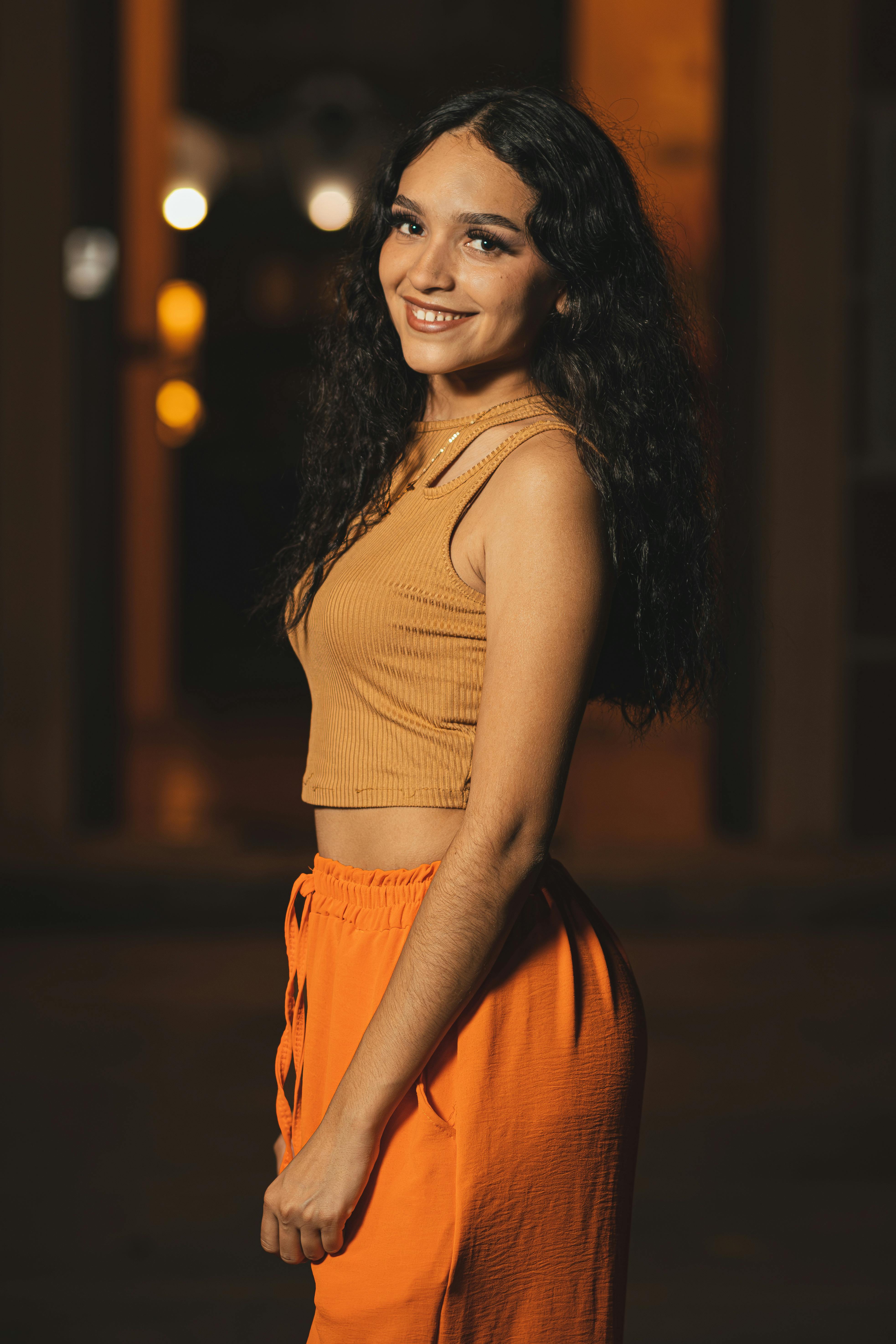 A Woman in a Crop Top and an Orange Skirt · Free Stock Photo