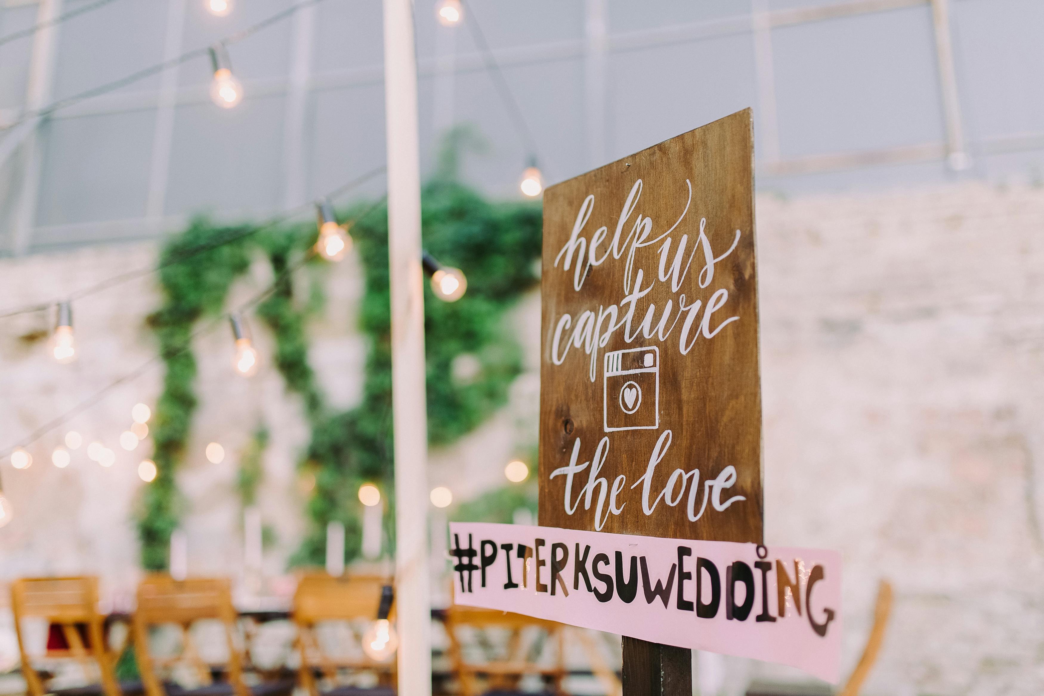 The Barn at Pleasant Acres with string lights and rustic neat decor - Barn wedding venues Maryland