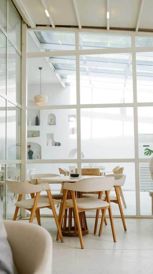 Free Elegant modern dining room with wooden furniture and bright natural lighting in Yalova, Türkiye. Stock Photo