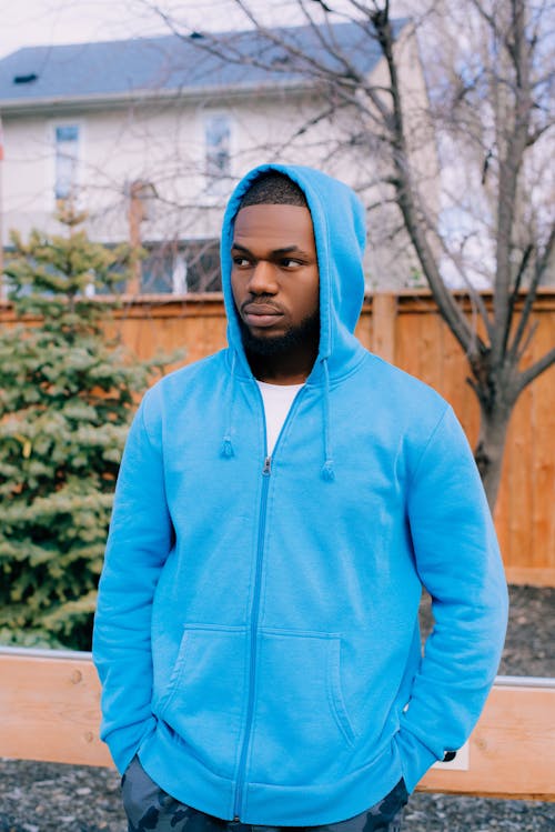 Man Posing in Blue Hoodie