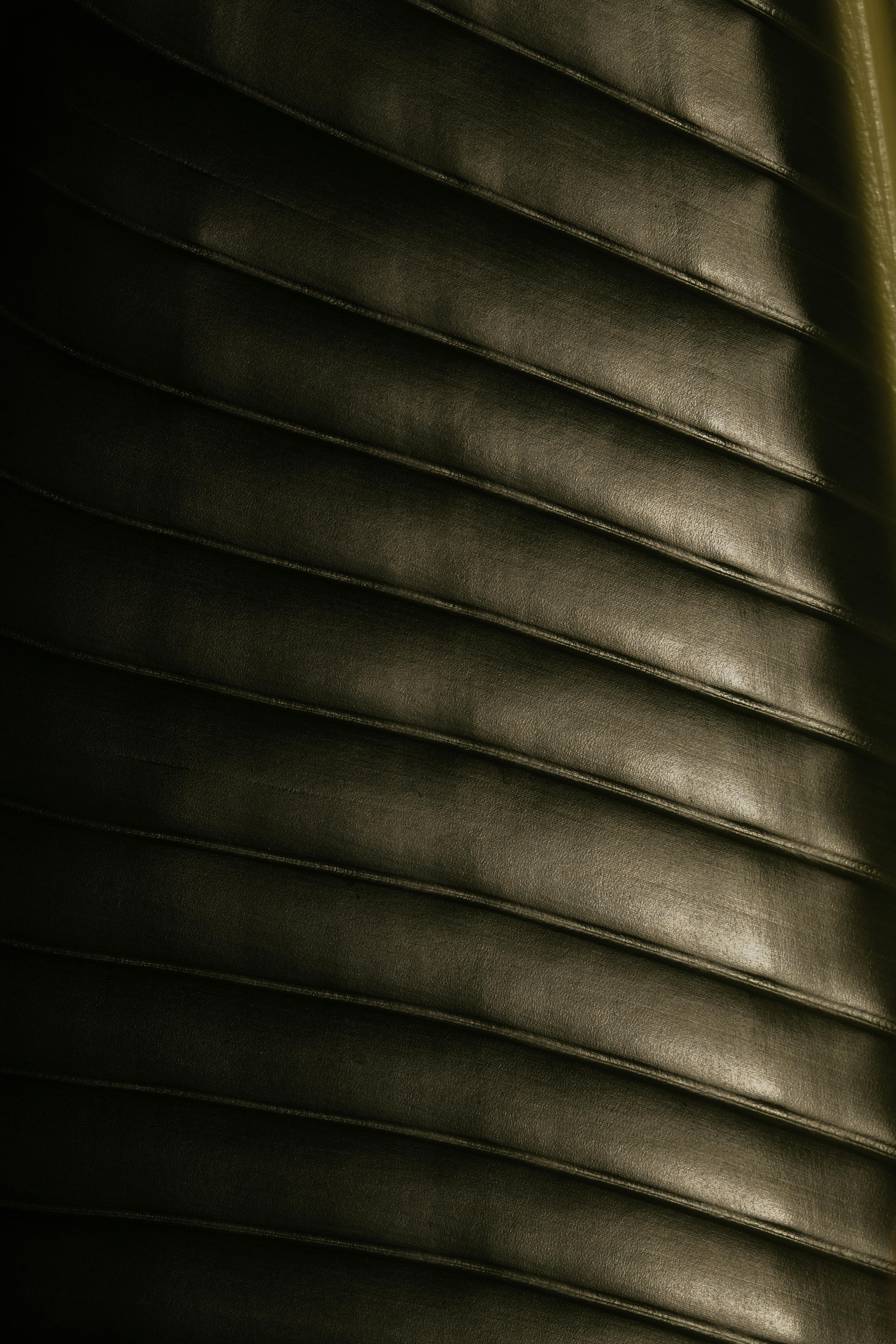 Free Detailed extreme close-up showcasing the texture and pattern of a dark plant leaf. Stock Photo