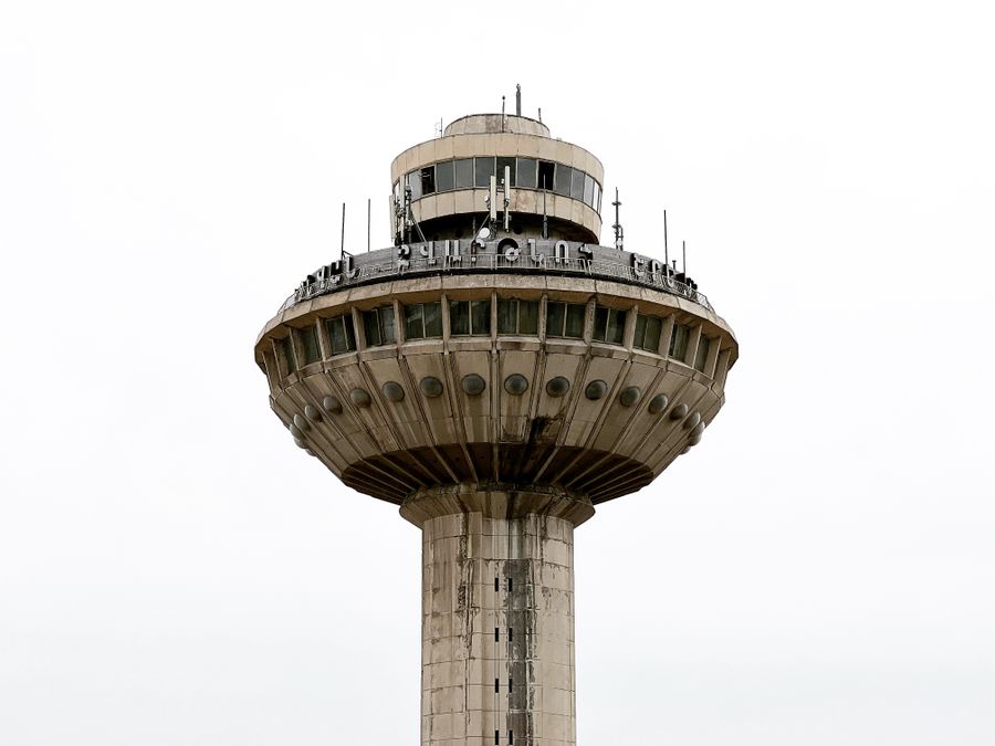 Close-up architectural detail of an airport control tower