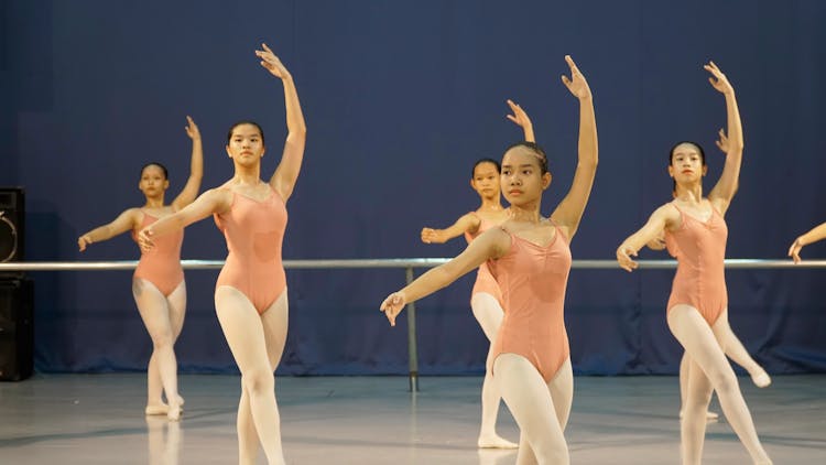 Ballet Dancers Training At Gym