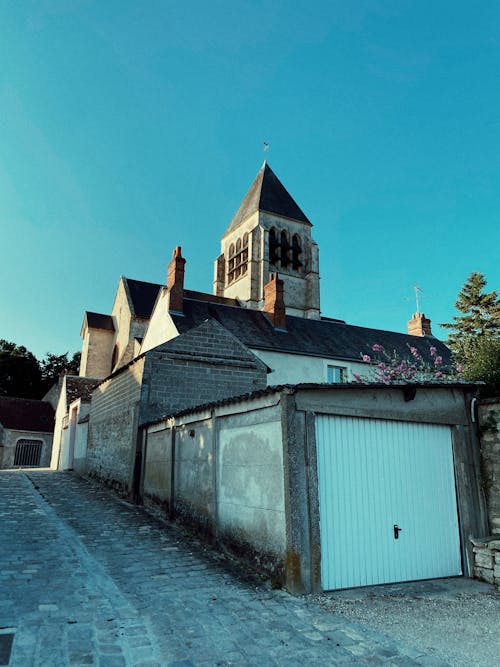 Garage and Church Tower behind