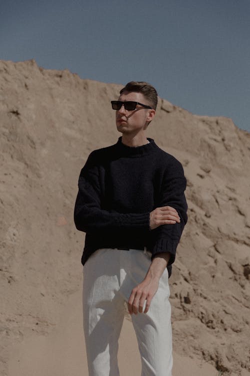 Man Posing in Sunglasses and Black Clothes