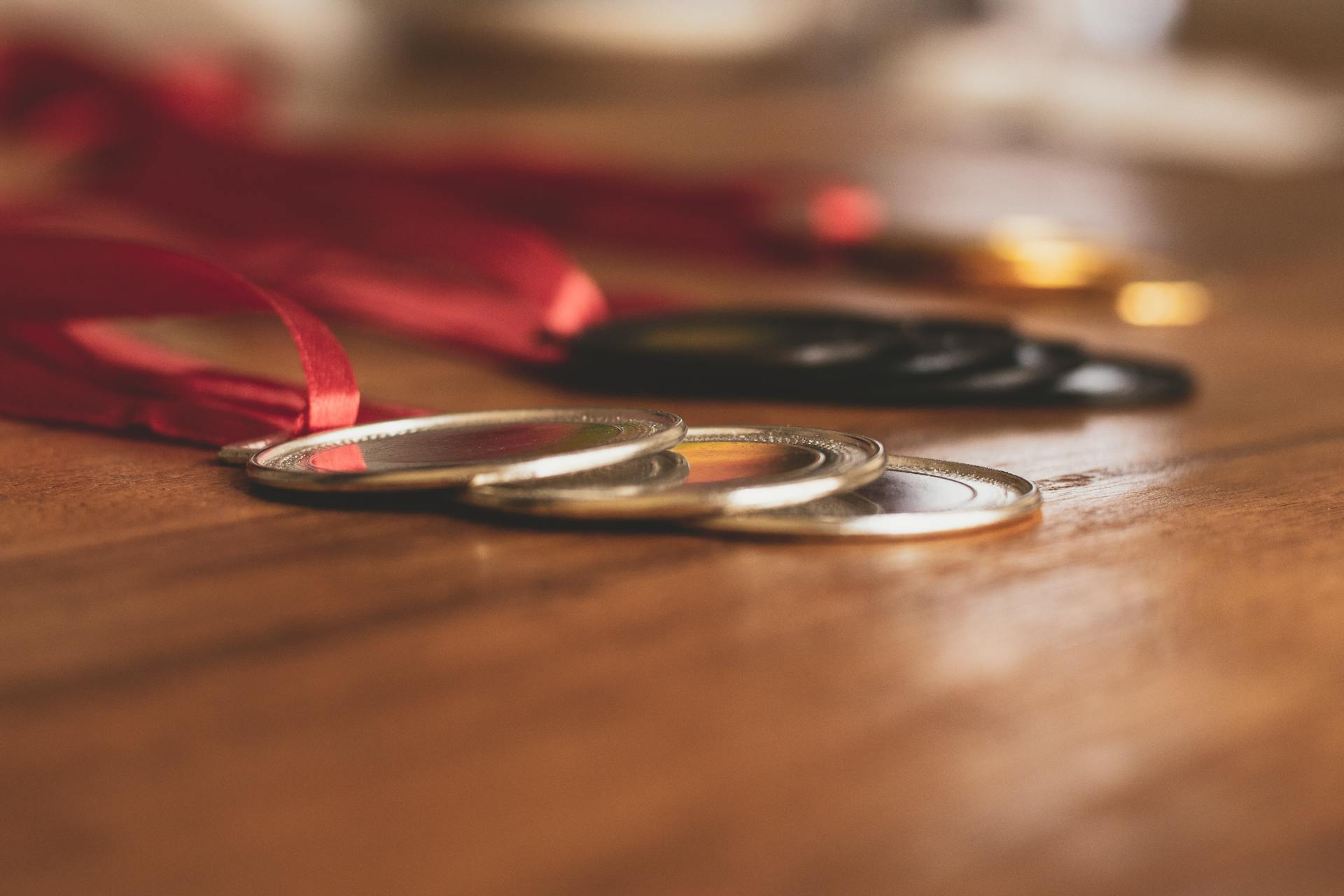 Gold, Silver and Bronze Medals on Table