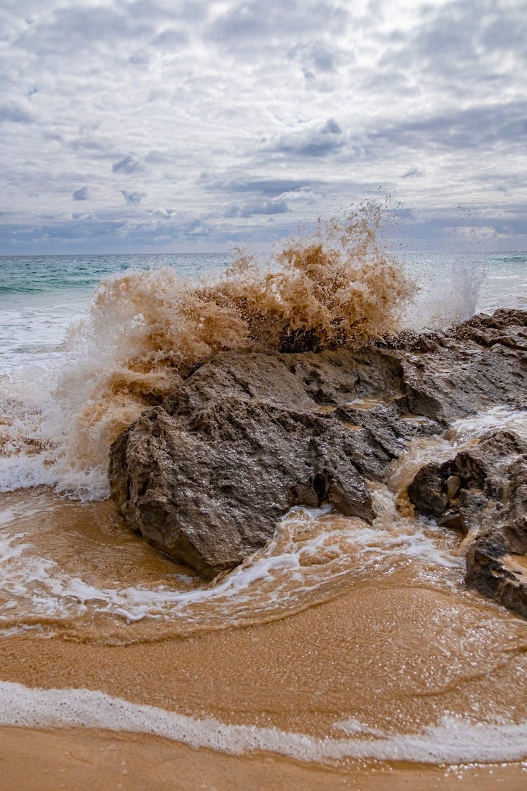 Waves Crushing On Rock On Sea Shore