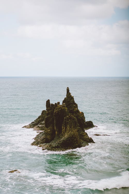 Rock Sticking Out Sea