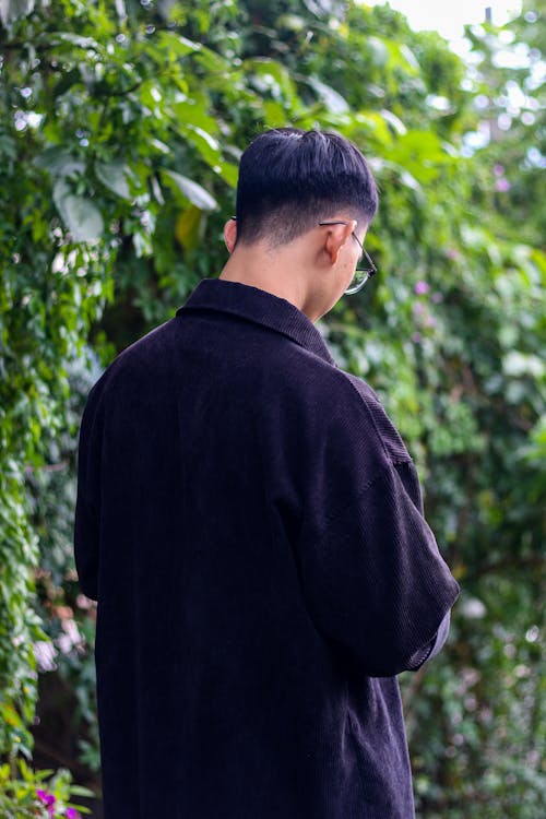 Back View of Man in Black Shirt