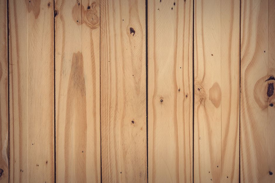 Wood needs sealing before paint, or the grain drinks it and the color goes patchy