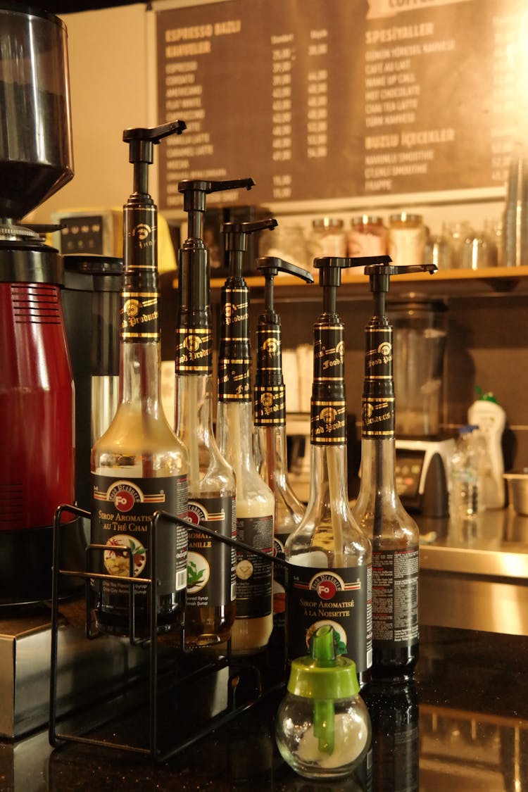 Coffee Syrups On Bar Counter