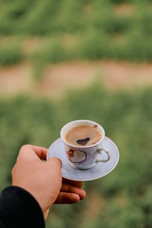 Cup of Espresso in Hand