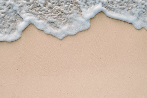 Water Foam on Sand