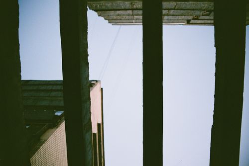 Free Unique perspective of urban architecture in Minsk, Belarus featuring geometric patterns and blue sky. Stock Photo