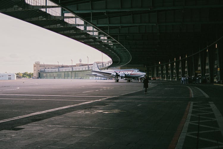 Small Plane Under Roof In Airport