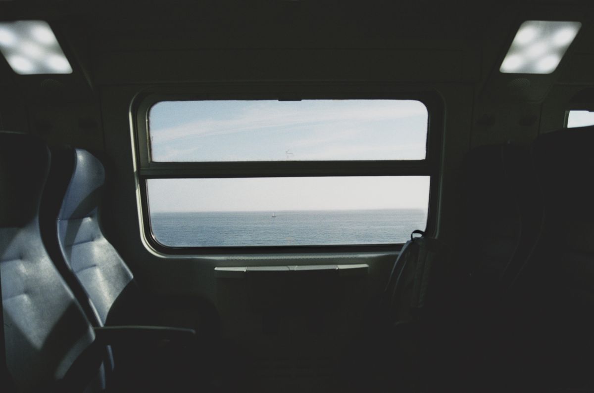 The sea seen from a train window on the Ligurian coast