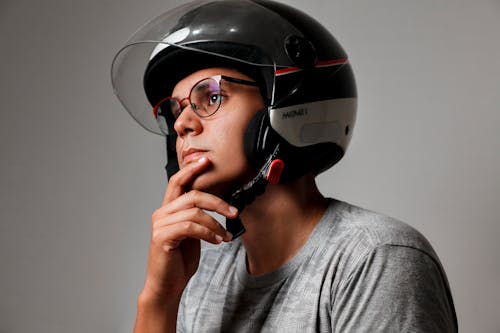 Thinking Man in Helmet