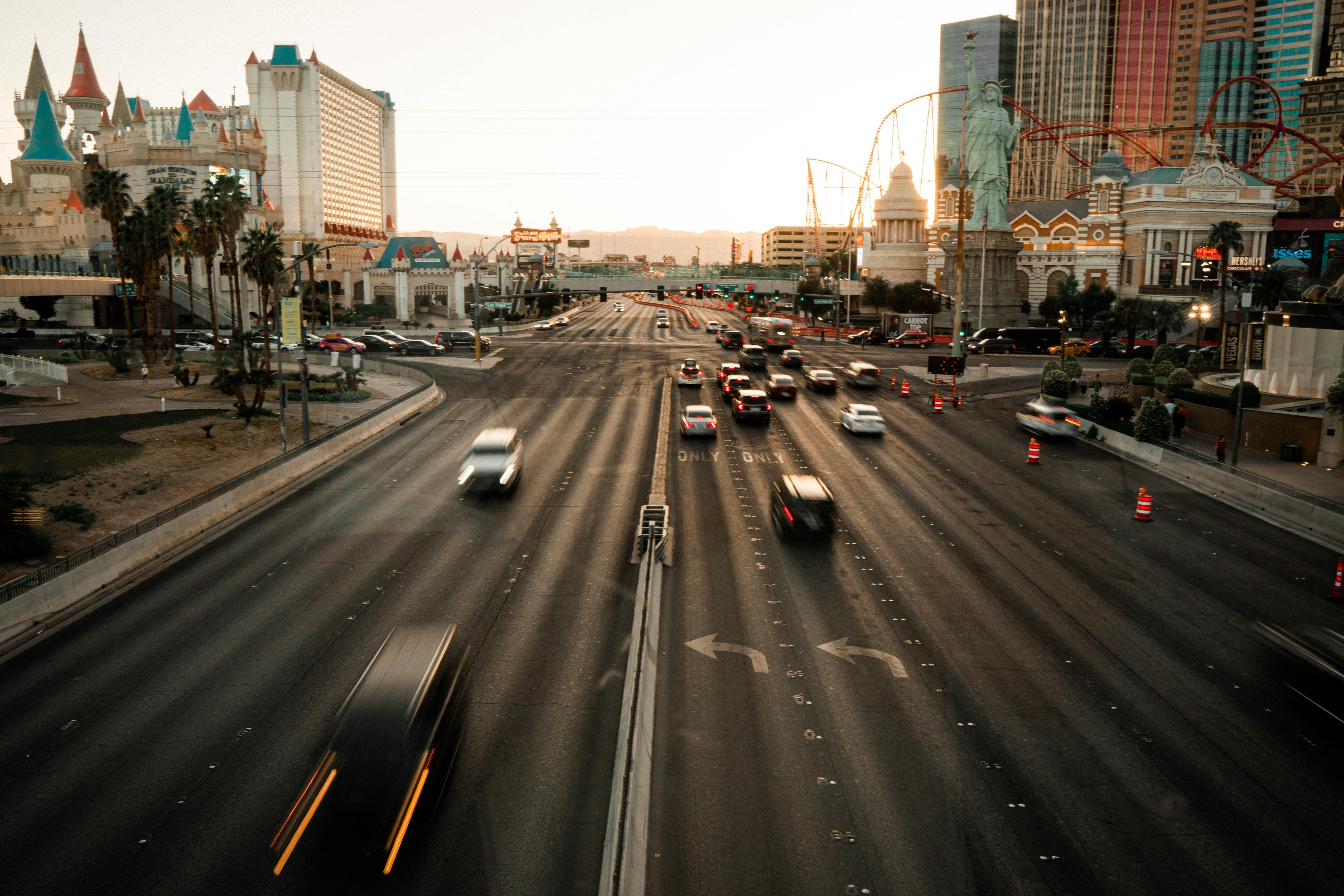 blurred cars on highway in city