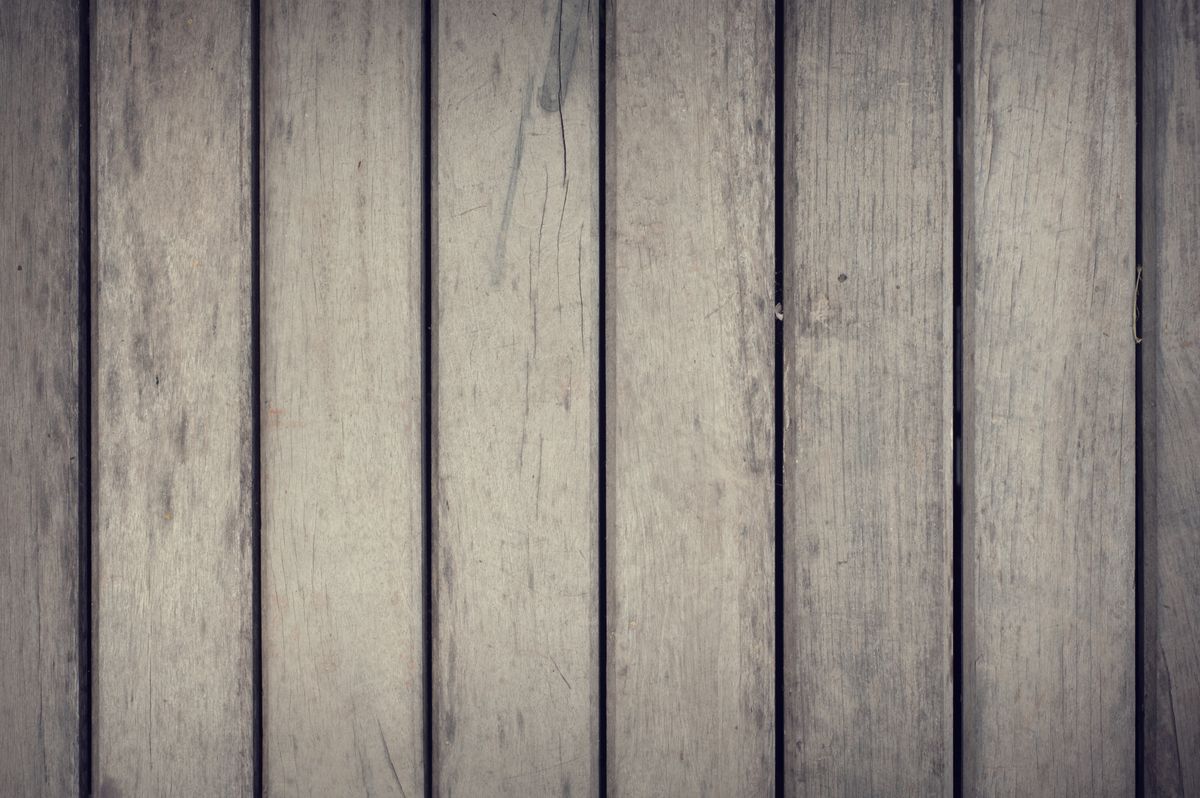 Close-up of aged wooden panels showcasing natural texture and patterns.