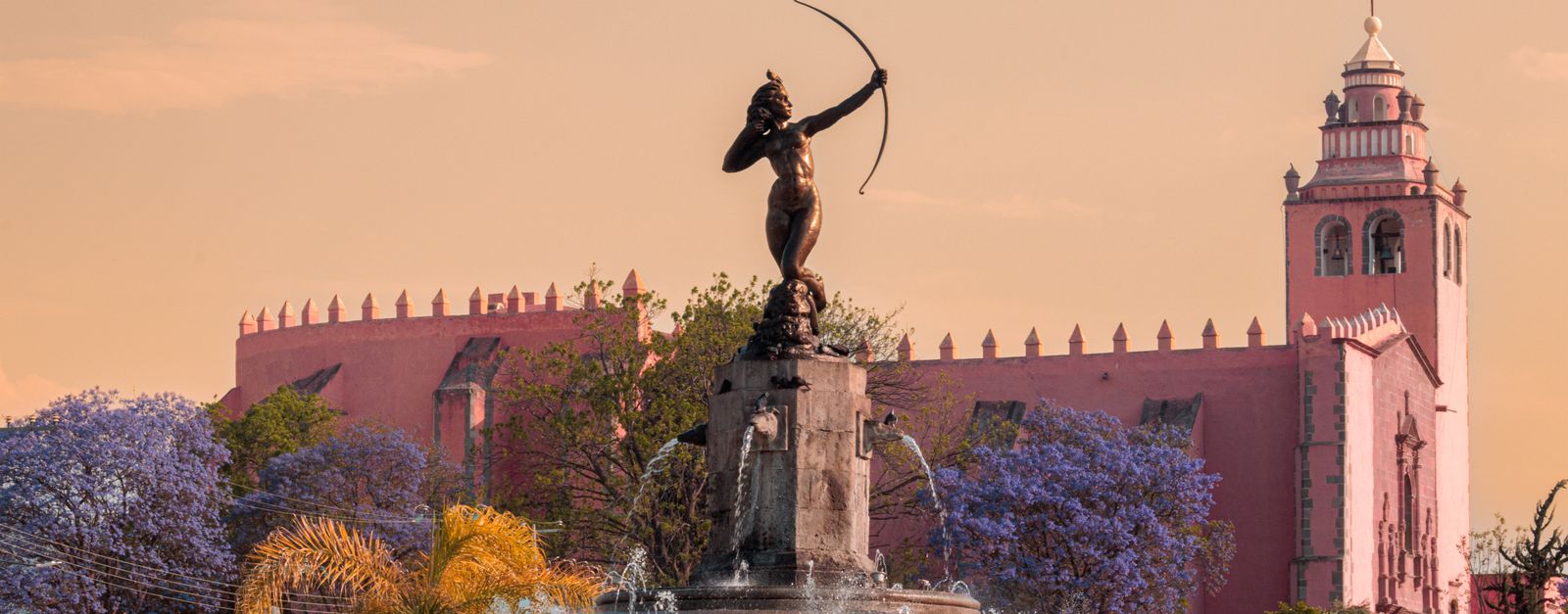Stunning view of a fountain with an archer statue in Dolores Hidalgo, Mexico, during spring.