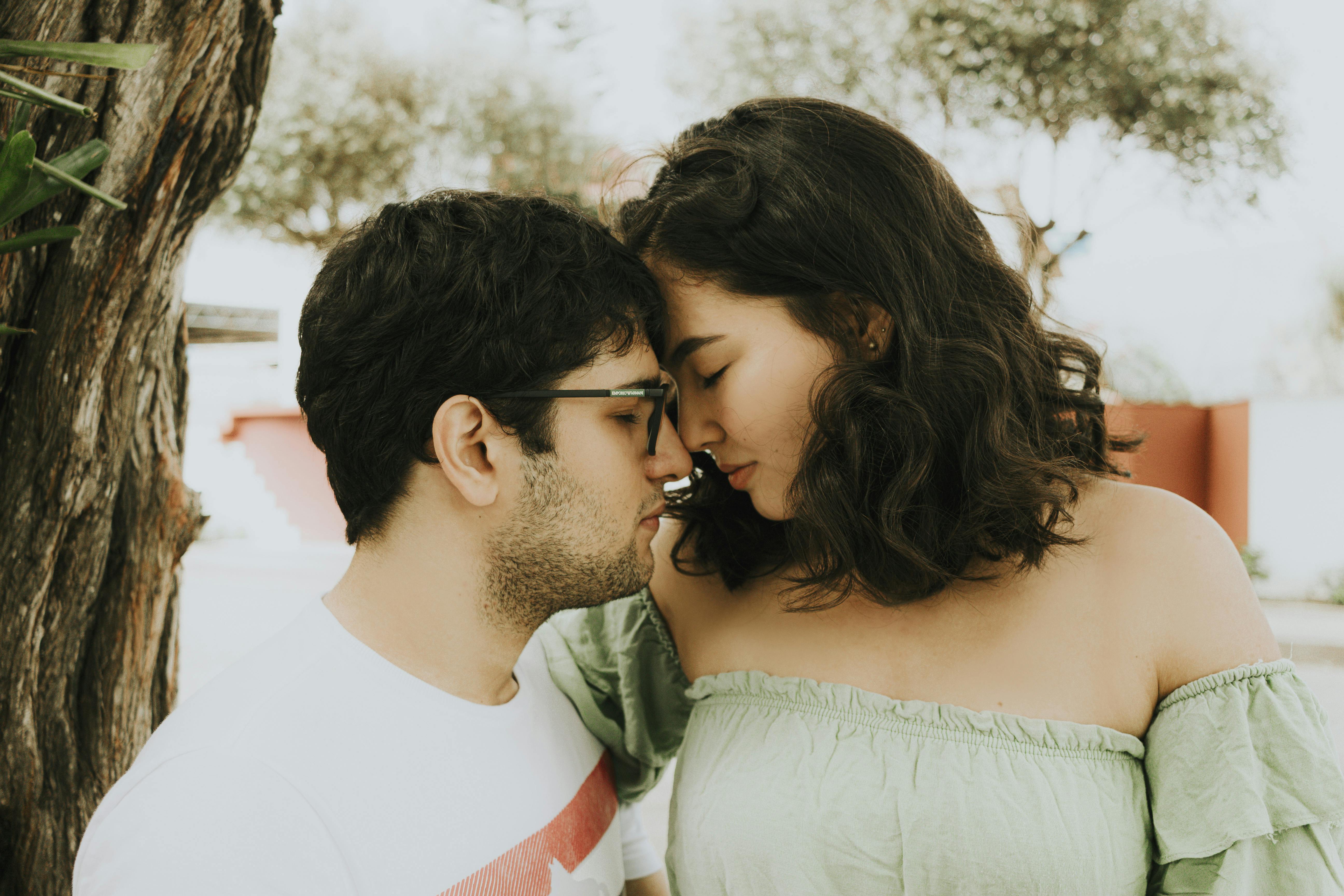 Closeup of an Affectionate Couple in a Park · Free Stock Photo