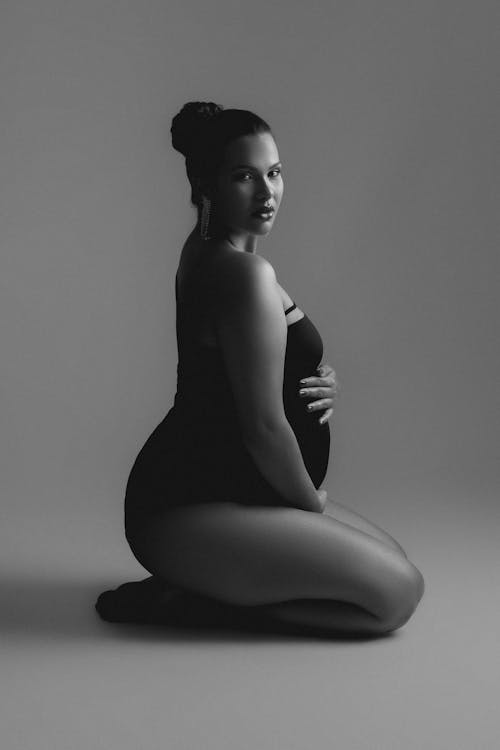 Pregnant Woman Posing in Studio