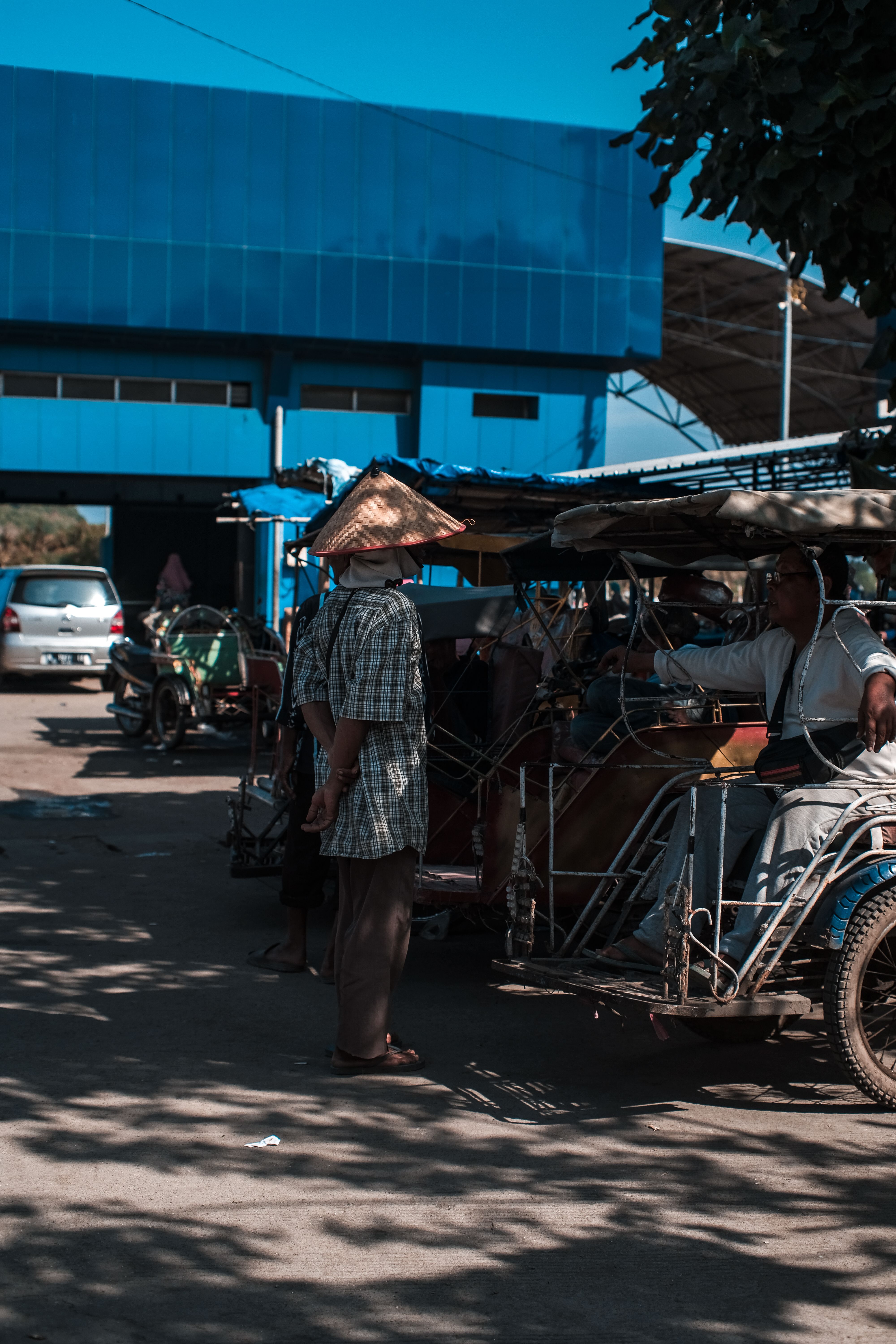 Man Selling Food on Street Market · Free Stock Photo