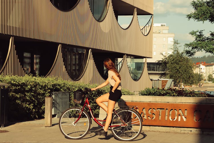 Woman On Bicycle In Town